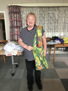 Wendy holding a Boomerang Bag.
